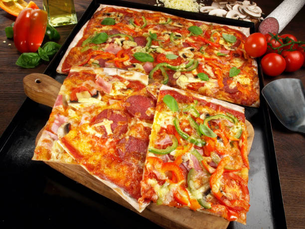 istock Baking Pizza on a Metal Tray 1919218243