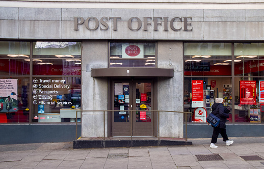 London, UK - January 9 2024: a person walks past Mount Pleasant Post Office.
