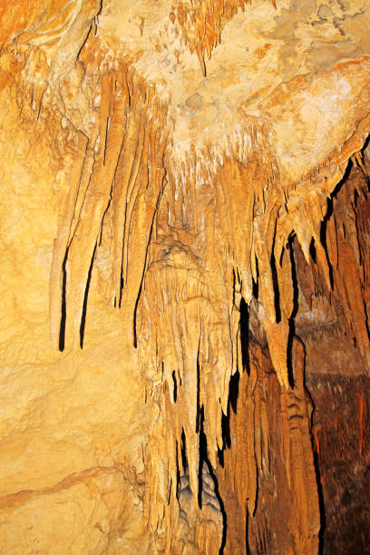 istock stalactites in the water tunnel 1919234654