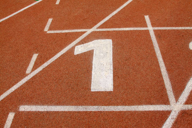 istock red plastic runway in a sports ground 1919239469
