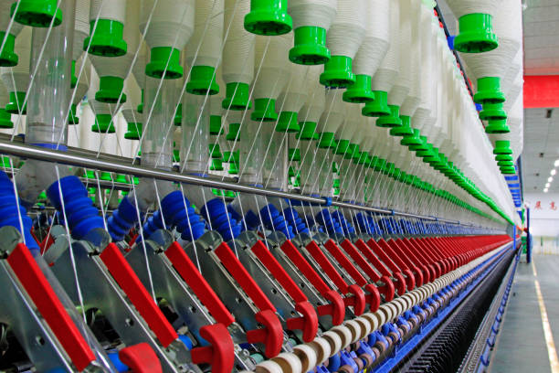 istock Textile spindles on the production line 1919240541