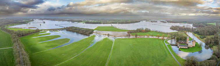 High water level in the river Vecht at the Dalfsen in the Dutch Vechtdal region in Overijssel, The Netherlands. The river is overflowing on the floodplains after heavy rainfal upstream in The Netherlands and Germany in December 2023.
