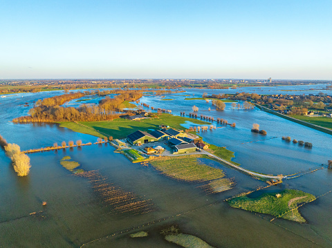 IJssel river with high water level on the floodplains of the river IJssel near the village of Zalk after a long period of heavy rain upstream in January 2023.