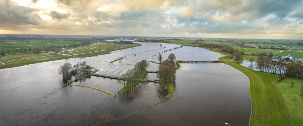 istock Vecht river high water level flooding at the Vechterweerd weir drone view 1919253477