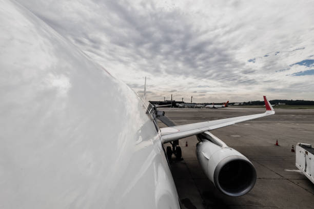 Airplane ready for boarding in a airport hub