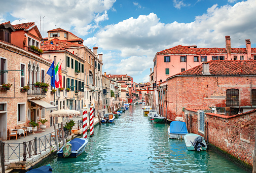 Venice canal view with historical buildings.