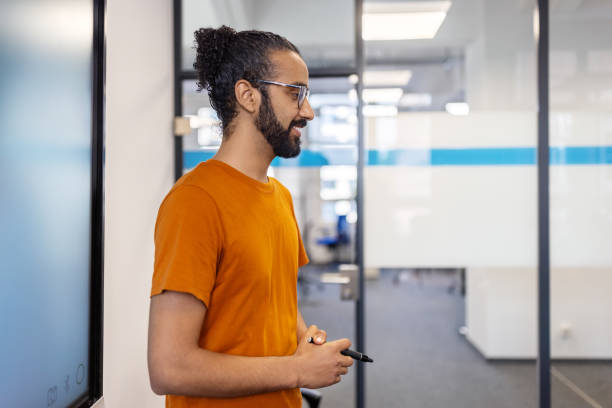 istock Businessman giving presentation at startup office 1919281809