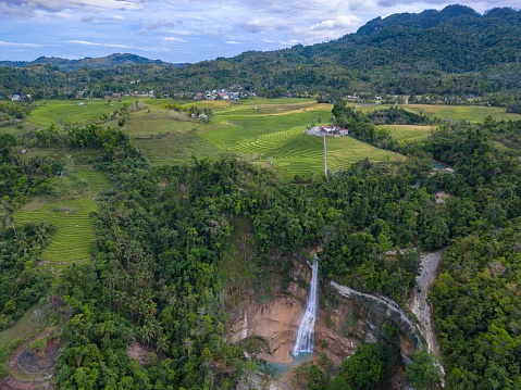 An aerial view of Cadapdapan rice terraces and Can-umantad Waterfall, Bohol Island, Philippines