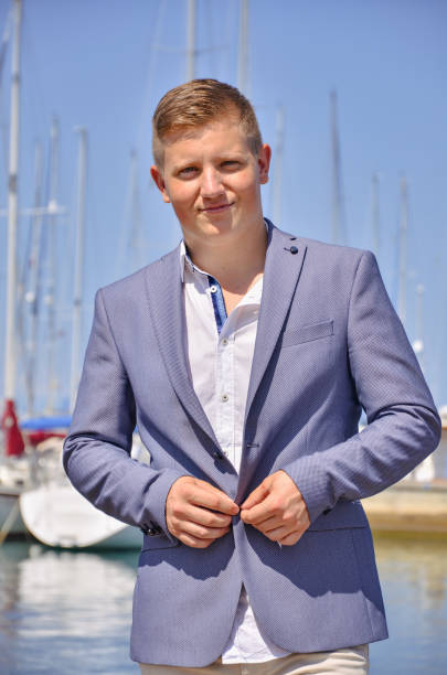 One man posing in the city harbor
