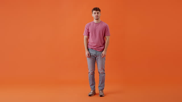 Young guy getting scared by empty space for advertisement
