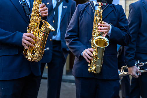 Fuente la Higuera, Valencia, Spain. 6 December 2023: Wind instrument music band making music on the street.