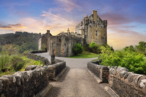 Eilean Donan Castle with at dramatic sunset, Scotland.