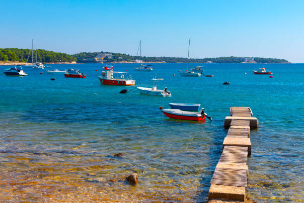 istock Wooden pier and boats view 1919388063