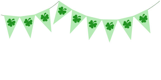 istock St Patrick Day green bunting pennants with clover symbol, flags garland, Irish holiday, panoramic decorative vector element for greeting card, poster, banner. Vector illustration isolated on white background 1919389634