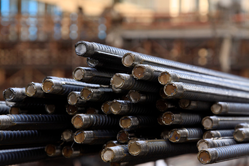 twisted steel at a construction site, closeup of photo