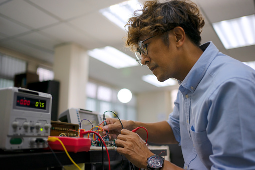 Componnt Engineer Engineer Work With Electronic Component At Workshop Stock Photo ...