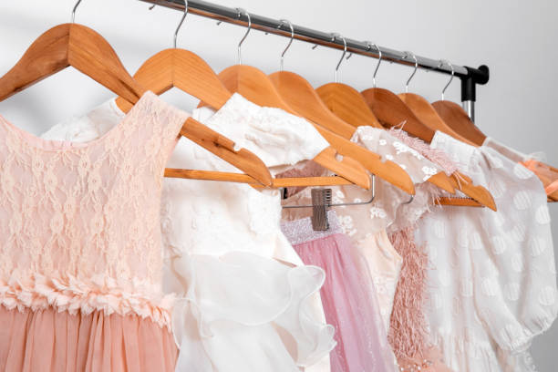 istock Close up carnival dresses on hangers. 1919447329