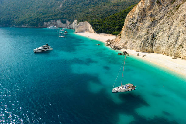 A beautiful lagoon of Fteri, beach, Kefalonia, Greece Beautiful lagoon of Fteri beach on Kefalobia, Greece. There are several sailboats anchored in the lagoon, and the sea is crystal clear, blue and turquoise. kefalonia stock pictures, royalty-free photos & images