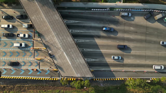 Aerial view Top down view of traffic on toll road gateway