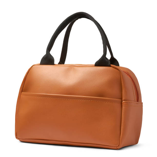 classic beige leather handbag isolated on white