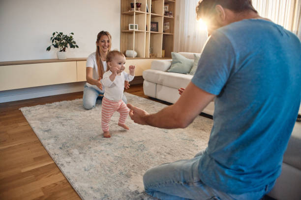 istock First steps of our baby 1919510315
