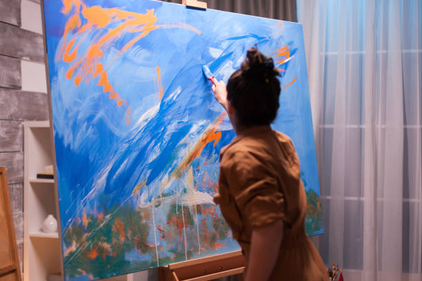 istock Painting with bright colors 1919524092