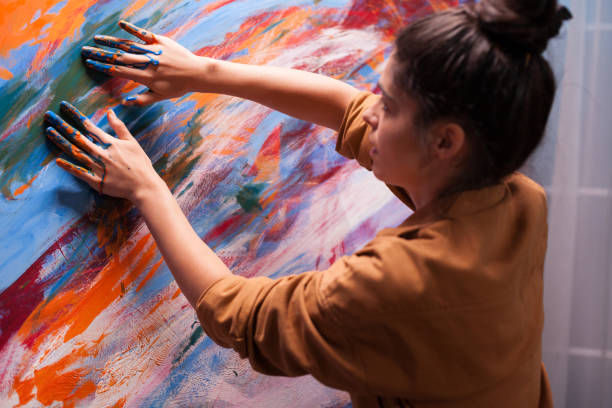 istock Painting with fingers 1919524632