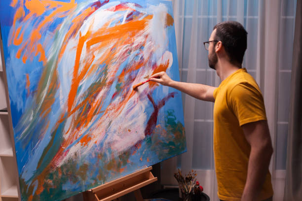 istock Young artist painting 1919538948
