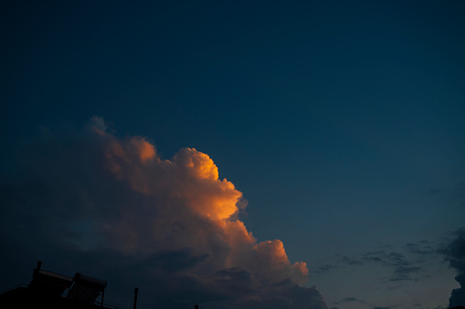 Sunset / sunrise with clouds, light rays and other atmospheric effect