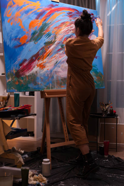 istock Artist painting with hands 1919548531
