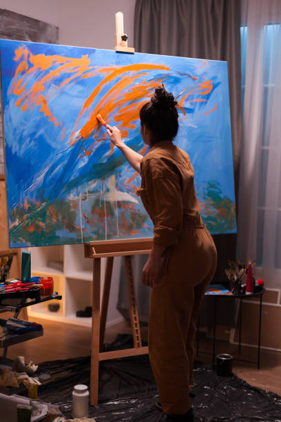 istock Contemporary painting in art studio 1919555966