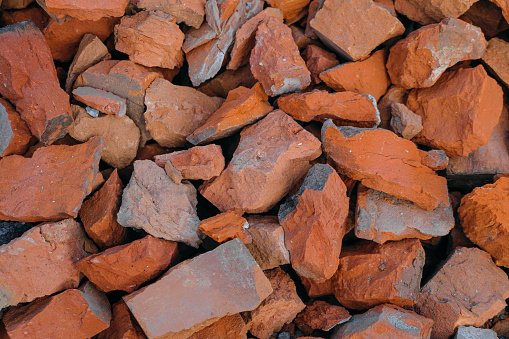 Stones made from broken red bricks close up