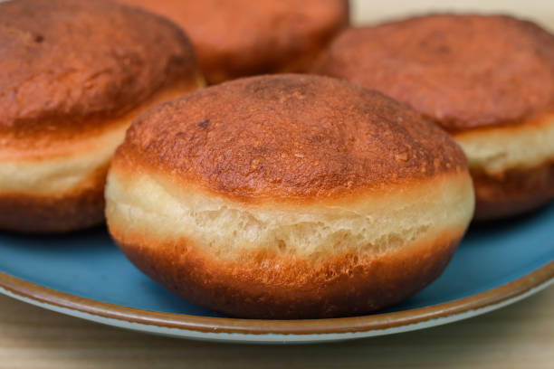 Perfectly fried traditional donut on a plate