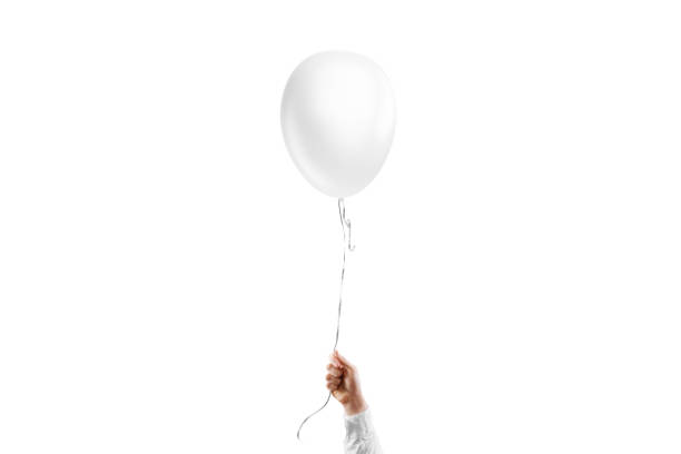 istock Hand holding blank white round balloon mockup, isolated 1919611235
