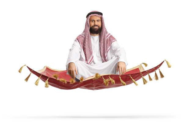 istock Bearded arab man sitting on a magic carpet and floating 1919632422