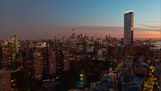 Panoramic view of the residential area of Manhattan East Side, New York at sunset. Aerial footage with the static camera.