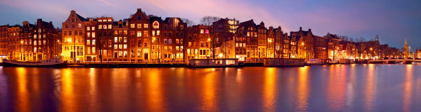 istock Panorama from Amsterdam with the Munt tower in the Netherlands a 1919732910