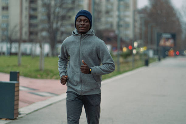 istock A young man is running early in the morning 1919737322