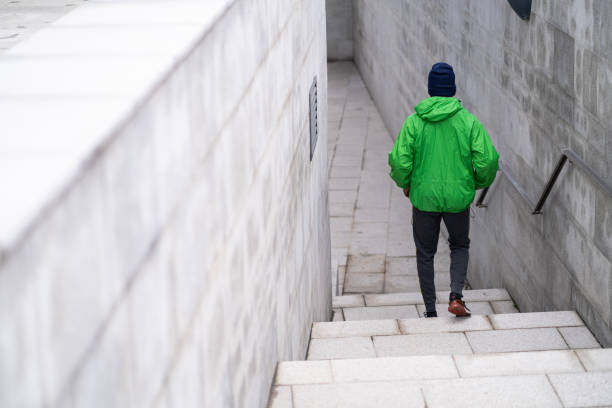 A young man is running early in the morning