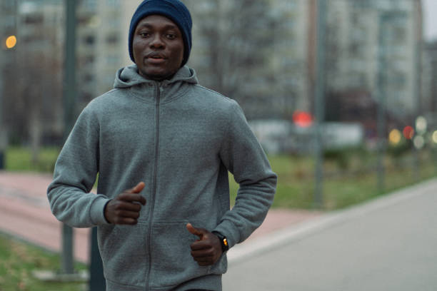 istock A young man is running early in the morning 1919747115