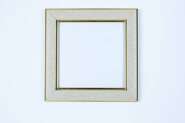 istock The frame is light, silver, the frame is white with gold edging on a white background. 1919777009