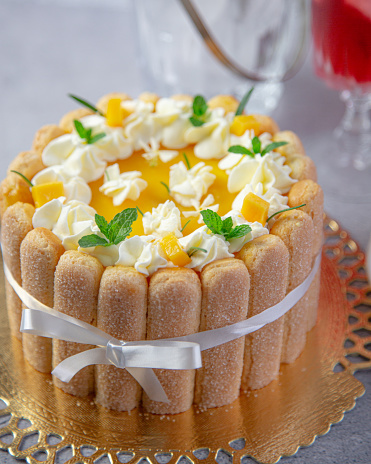 a mango charlotte cake with exotic flavors