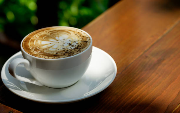 istock A coffee on the wood table background. 1919782539