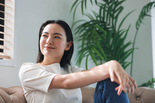 istock Young woman relaxing indoors 1919786341