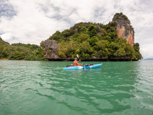 istock Mature man kayaking in thailand 1919806809