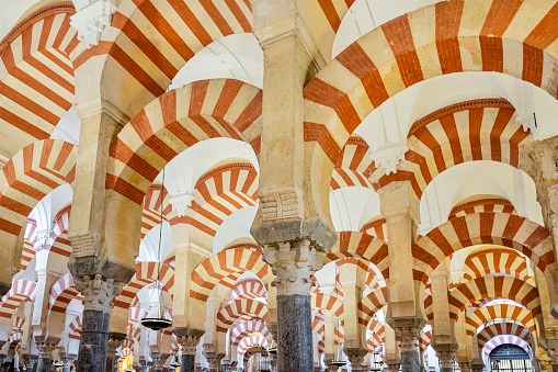 Panoramic view of the Cordoba Mosque in its interior illuminated by natural light.
