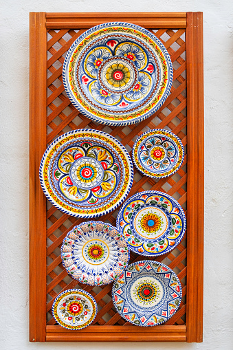 Colorful painted ceramic plates for sale in the core of the Cordoba old town