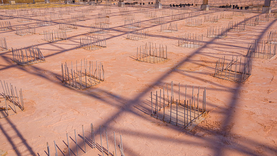 Deep foundation footing reinforcement steel on the ground for reinforced concrete floor work in the construction site of large industrial building