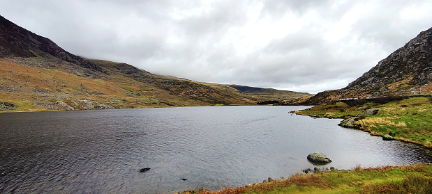 Llyn Ogwen lake with rolling hills on a winters day