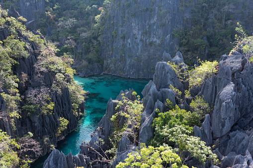 Aerial view of the waters and mountains at Twin Lagoon in the Philippines